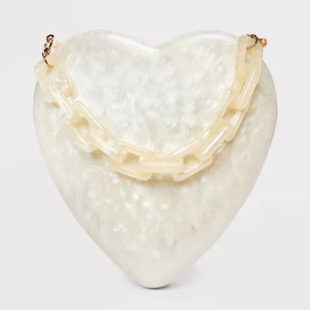 NWT “A new day” heart shape handbag